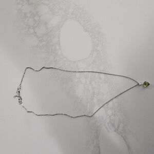 Heart Shaped Peridot Birthstone Necklace With Small Diamond